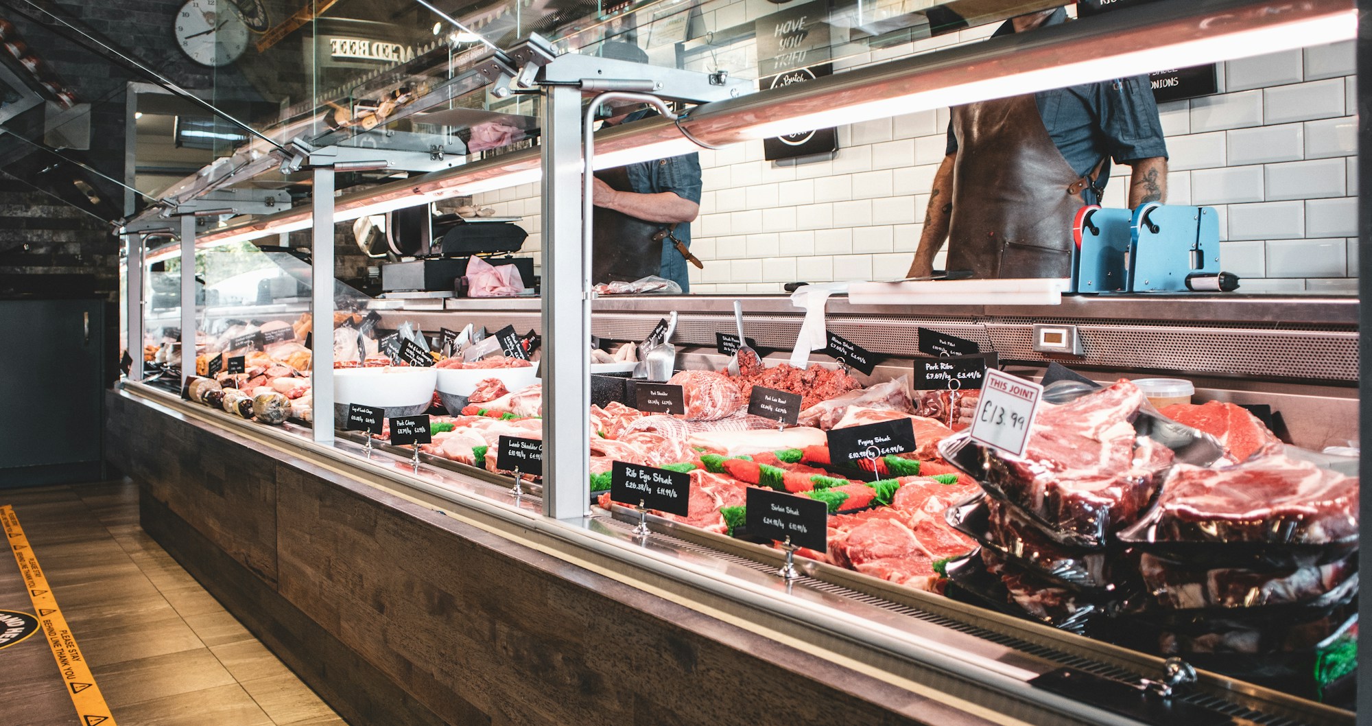 Fresh meat displayed at a butchery counter